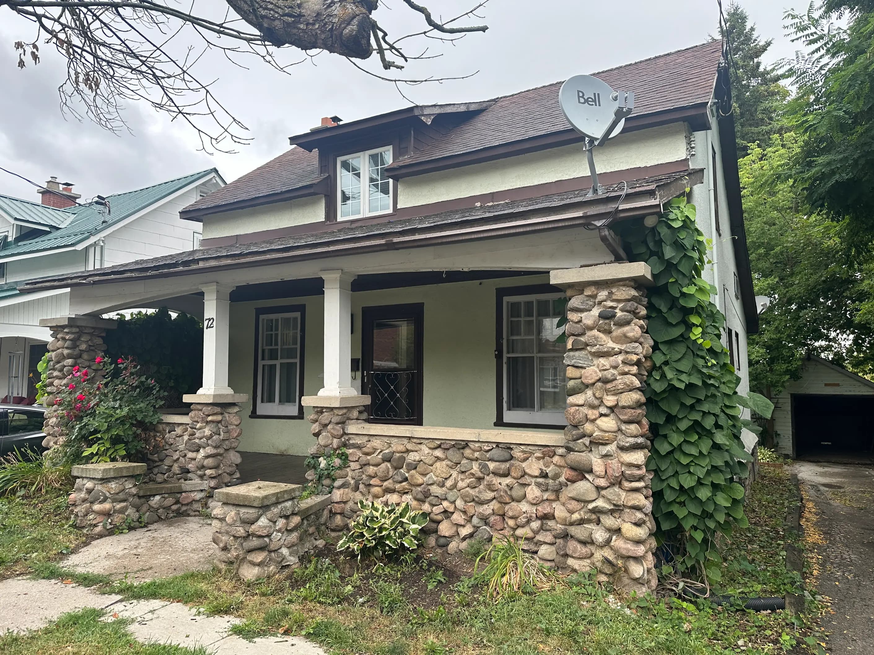 Cash home purchase, Okotoks, Alberta Character bungalow with stone porch pillars in Okotoks, Alberta — the kind of as-is foothills home Canadian Home Buyers purchases for cash.